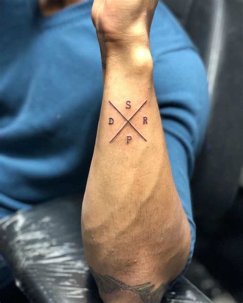 Interesting tattoos small - Phil walked into the lobby of the tattoo shop wearing a beanie hat paired with a tank top showing little peeks into his own rich tattoo history. I searched different... Edit Your P...